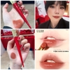 Son môi Christian Louboutin Stiletto Glossy shine (hình bút nhọn vỏ đỏ)