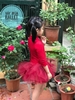 Váy múa đỏ đô nhũ cổ lọ tay lỡ