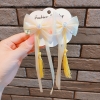 Set 2 kẹp tóc nơ phối ngọc tua rua