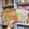 Capybara Thành phố hạnh phúc - Sách bóc dán hình trò chơi tương tác Gáy Lò xo dễ chơi - Minh Thắng