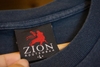 CONOURING LION RASTAFARI TEE