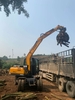 Xúc đào gắp gỗ
