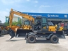 Xúc đào gắp gỗ