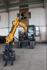 Xúc đào gắp gỗ