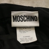 mũ Moschino đen trần trám lambskin tag chữ vàng MOSCHINO