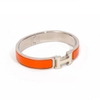 Vòng tay Hermès Clic Clac Màu Cam Khóa Trắng