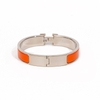 Vòng tay Hermès Clic Clac Màu Cam Khóa Trắng