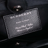 Túi Burberry The Baby Banner And House Check Màu Đen Đính Đinh Tròn Khóa Trắng