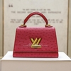 KG-Túi LV Twist màu màu đỏ đậm da đà điều khóa vàng