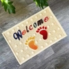 Thảm nhựa lau chân Welcome hình bàn chân