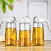 Bình đựng dầu ăn thuỷ tinh có nắp đóng mở tự động 630ml