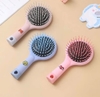 Lược chải tóc rối đệm khí có gương xinh xắn