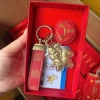 Móc khoá thần tài cưỡi ngựa may mắn full box