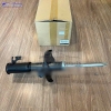 giam-xoc-truoc-ford-laser-chinh-hang