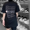 CHAMPION TAGLESS GRAPHIC FRONT LOGO 7 LINES TEE BLACK
