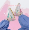 Jordan 1 Mid Features Paint Drip