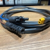 Cuộn cáp MC4 to XT60 Solar Cable với đầu nối vàng đặt trên nền vải xanh dương