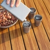 Ly Uống Rượu Keith Titanium Wine Cup 10ml đang rót rượu vào ly trên bàn gỗ