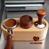 the-wooden-base-supports-the-espresso-tamper