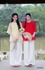 Nhẹ nhàng, mềm mại với set áo lam tơ nút bọc, quần lụa suông HC USD001