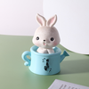 Đồ chơi Thỏ sứ ngồi bình tưới màu XANH