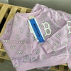 Bộ cotton dài tay nỉ da cá MLB tím
