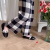 Quần caro đen trắng chất len ống loe cho bé gái
