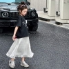 Bộ áo phông cotton họa tiết nơ kèm chân váy voan dáng dài