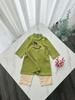 Áo dài bé trai linen thêu hình Ngựa gỗ xanh lá