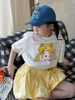 Chân váy bí màu vàng đính nơ Kumai.Kid