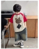 Bộ Hi.Sun áo raglan đỏ be in hình gấu mix quần jean đen lưng chun