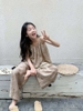 Bộ thô áo hai dây nâu quần dài hoa lá bé gái