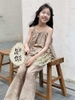 Bộ thô áo hai dây nâu quần dài hoa lá bé gái