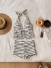 Bộ bơi Monokini màu be quần sooc họa tiết kẻ ngang