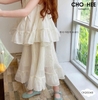 Bộ voan sát nách Cho Hee đính nơ màu kem chân váy