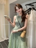 Set Y Jia áo sát nách dệt kim kèm chân váy voan dáng xòe dài 4 màu