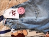 Quần baggy jean cạp chun phối dây hồng mặt cười cho bé gái