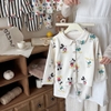 Bộ Pyjama Qibao màu be nhân vật Mickey Donald