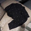 Bộ pyjama đen dài tay hoạ tiết vuông cho bé