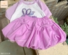 Bộ cotton cộc tay tím BABY THREE UNICORN hãng Jam&Jenny chân váy xòe đính nơ phối áo tay raglan tím-trắng