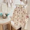 Bộ Pyjama Qibao trắng hình bé gái tóc nâu nơ đỏ
