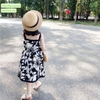 Váy Mia Kids chất thô cổ yếm họa tiết hoa đen nền trắng