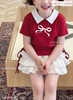 Bộ áo đỏ nơ chân váy trắng Luca Luca