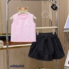 Bộ WinWin 3-8Y Nexxi áo thun sát nách croptop 2 màu hồng, đen đính nơ chân váy kate xoè