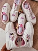 Giày sneaker ZARA Sanrio Hello Kitty trắng kèm charm trái tim