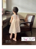 Váy sát nách ren trắng nơ lưng Anni Kids dáng suông