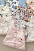 Bộ Pyjama Qibao trắng hình bé gái tóc nâu nơ đỏ