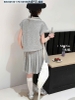 Bộ polo ALO Munaya chân váy xếp ly màu ghi