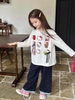 Áo thun dài tay trắng hình Hello Kitty đính nơ