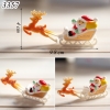 Tuong - Ông già noel và tuần lộc trượt tuyết